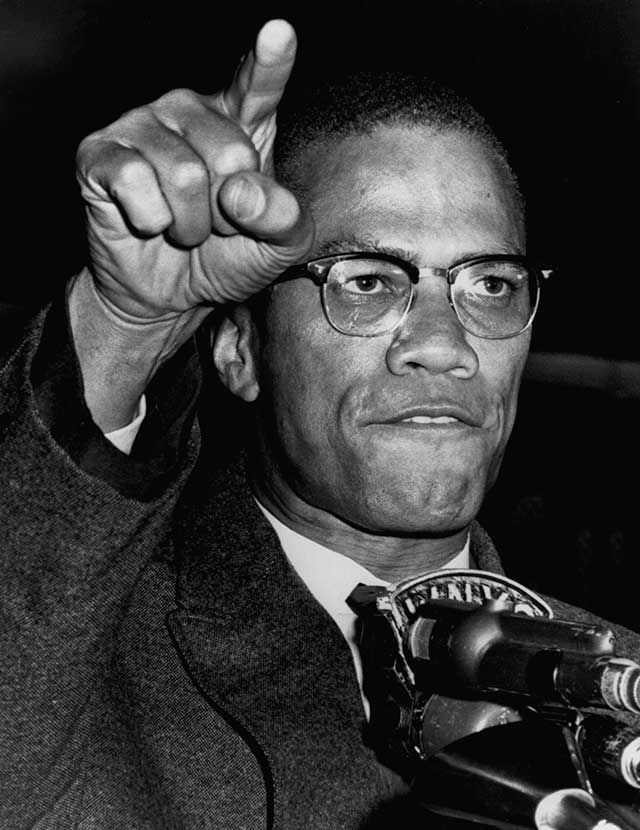 . . . but that same month, more radical leaders, especially the fiery Malcolm X, began preaching the harsher doctrine of resistance to racist oppression “by any means necessary,” including violence. (BETTMANN/GETTY IMAGES)