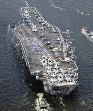 No pirates in these waters: the USS George Washington heads for Yokosuka, Japan.