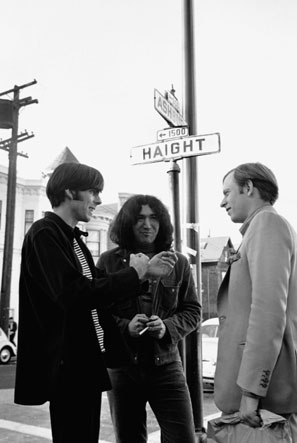 Wolfe (right) with the Grateful Dead's Jerry Garcia (center) and the band's manager, Rock Scully, in 1966 San Francisco
