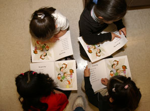 Kindergartners learn to read using the Core Knowledge program.